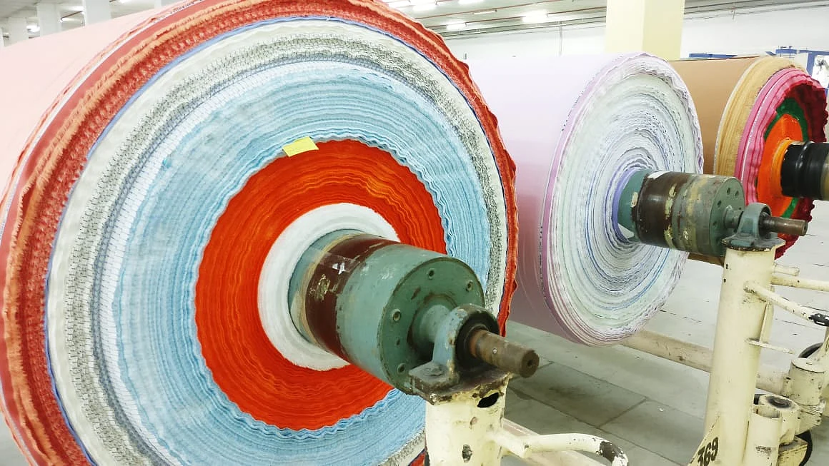 A textile roll at Arvind Ltd.’s Santej manufacturing plant in Gujarat. (Photographer: Rajendra Giri/BloombergQuint)