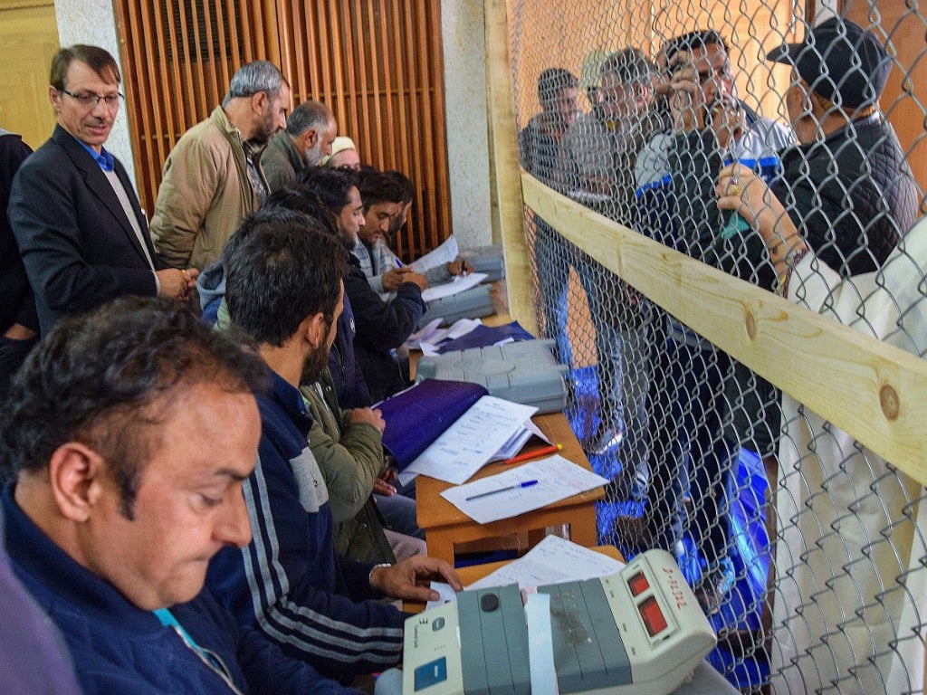 <div class="paragraphs"><p>Candidates looks on as polling staff count the votes of urban local body elections. (Photograph: PTI)</p></div>