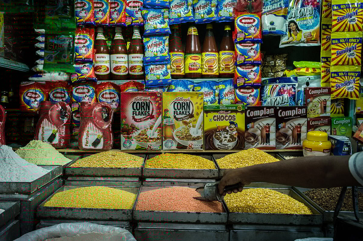 Pulses are displayed for sale in front of packaged goods at a grocery store. Photographer: Sanjit Das/Bloomberg