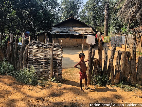 A child of the Gond tribe outside her home in Badrimau village, in Maoist-affected Bastar district, southern Chhattisgarh. Many villagers received forest titles without applying, but in the absence of government services and development, land titles and elections mean nothing, locals say.