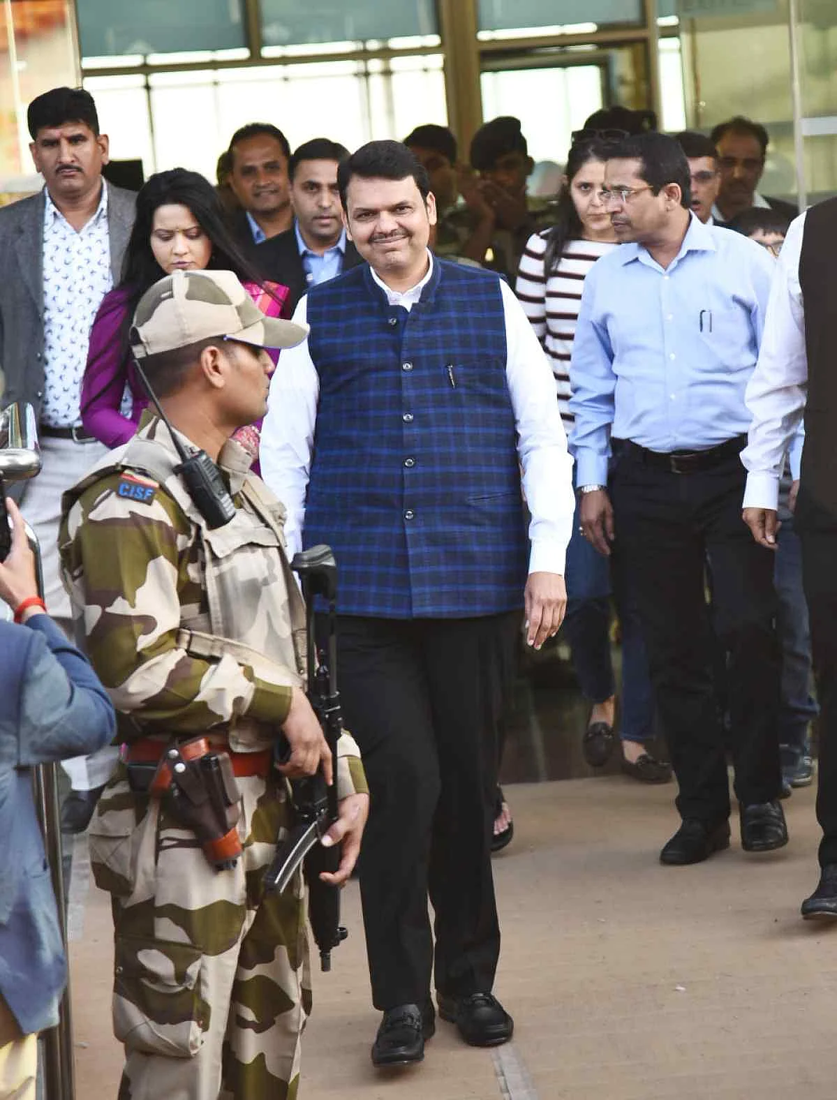 Maharshtra’s Chief Minister Devendra Fadnavis arrives at the Udaipur airport for the Isha Ambani-Anand Piramal pre-wedding celebrations. (Photo: Yogen Shah, The Quint)