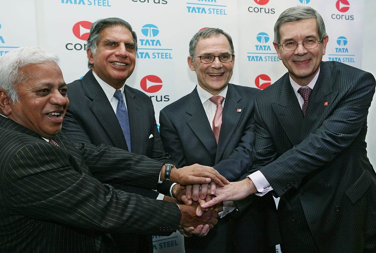 Top executives of Tata Steel and Corus Group, after a news conference, in London, on Oct. 20, 2006. (Photographer: Suzanne Plunkett/Bloomberg News)