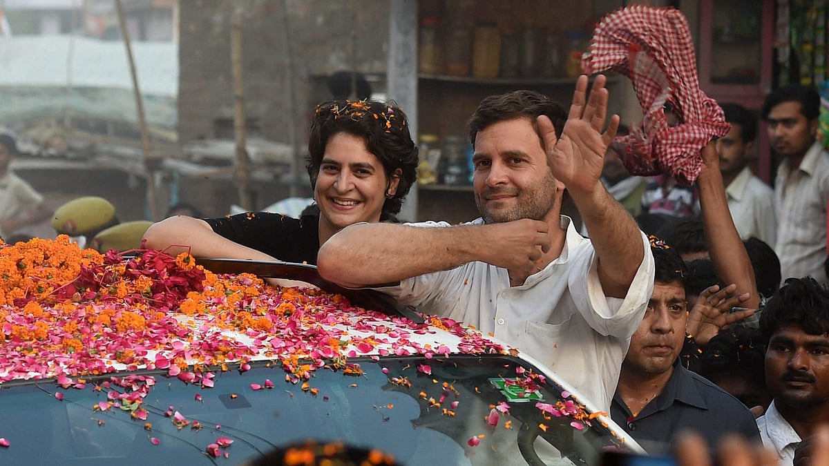 Priyanka Gandhi Vadra with Rahul Gandhi during a road show in Amethi, on May 4, 2014. (Photograph: PTI)