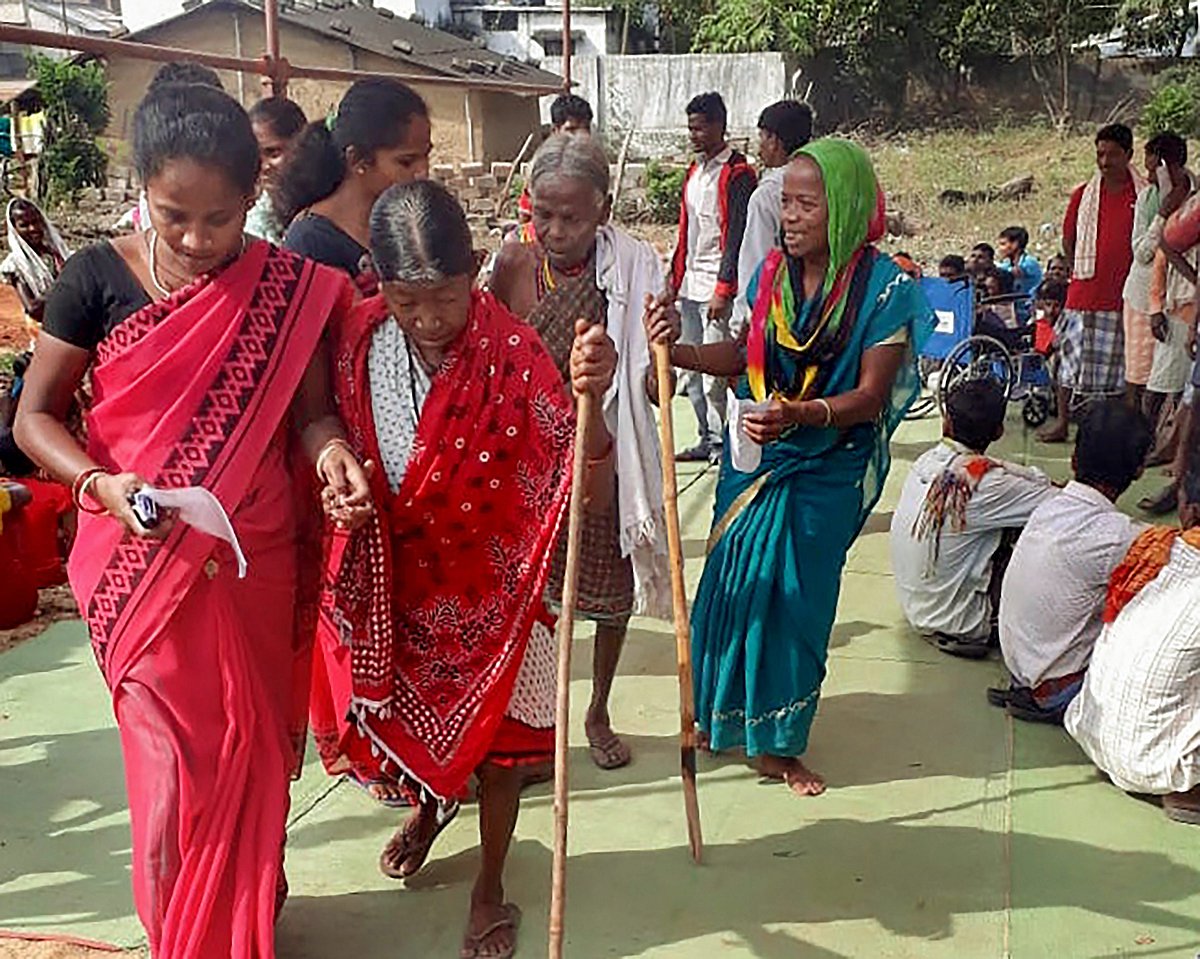 Elderly voters arrive to cast their votes at a polling booth  in Sukma, Chhattisgarh. (Photograph: PTI)