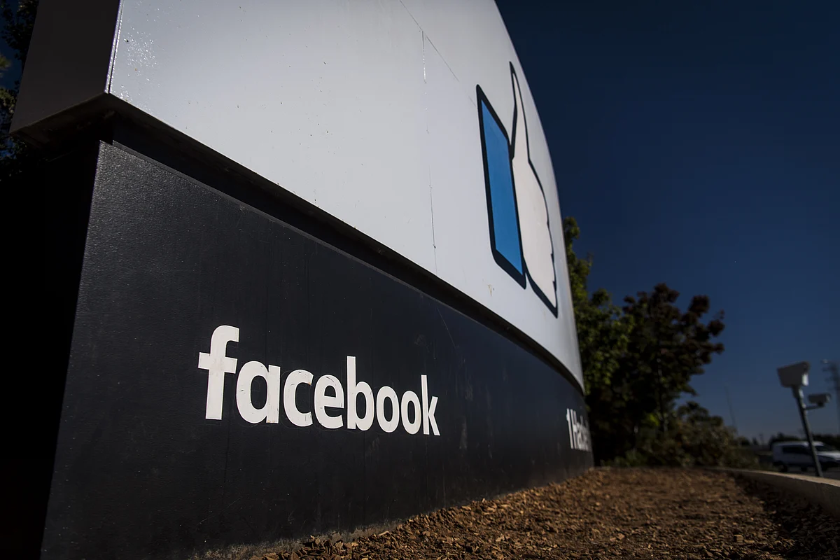 Signage is displayed outside Facebook Inc. headquarters in Menlo Park, California. (Photographer: David Paul Morris/Bloomberg)