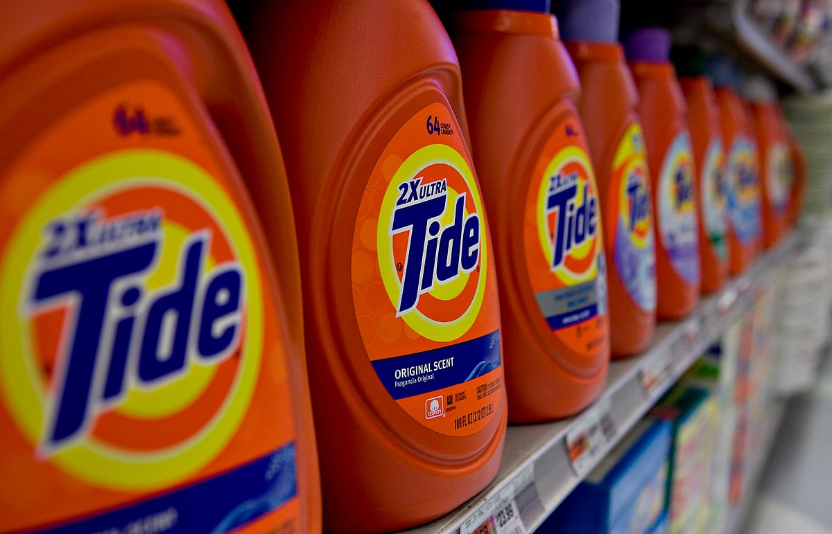 Procter &amp; Gamble Tide brand laundry detergent sits on display in a supermarket. Photographer: Daniel Acker/Bloomberg