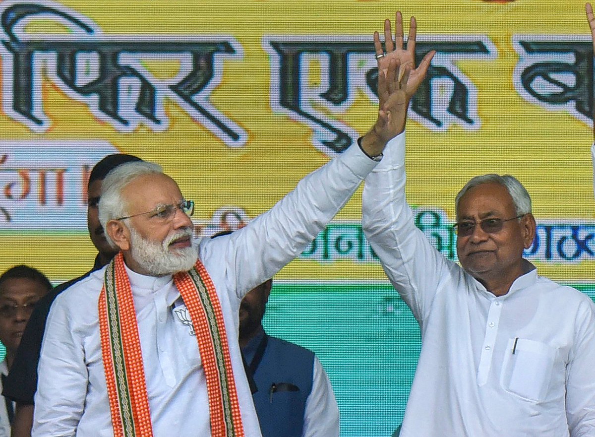 <div class="paragraphs"><p>PM Narendra Modi and Nitish Kumar wave at party supporters during an election rally. (File image: PTI)</p></div>