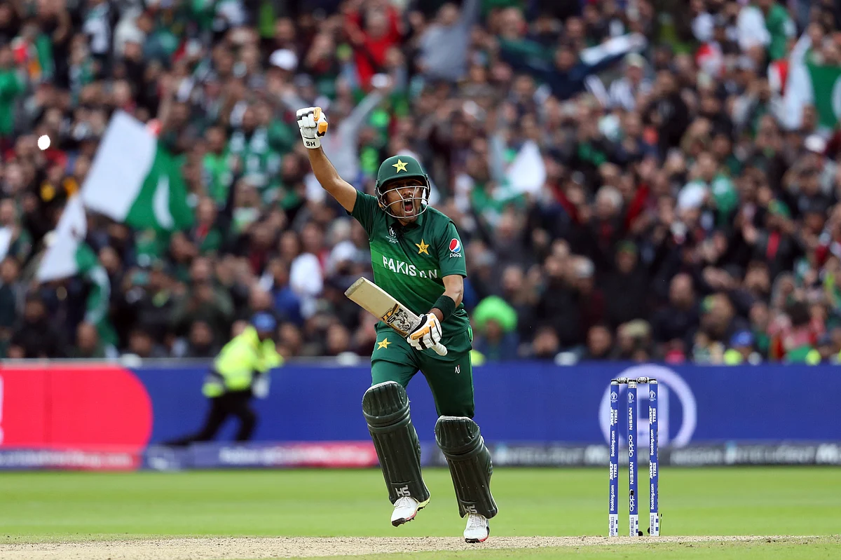 Pakistan’s Babar Azam celebrates scoring a century, on the way to defeating New Zealand, in Birmingham, on June 26, 2019. (Photograph: AP/PTI)