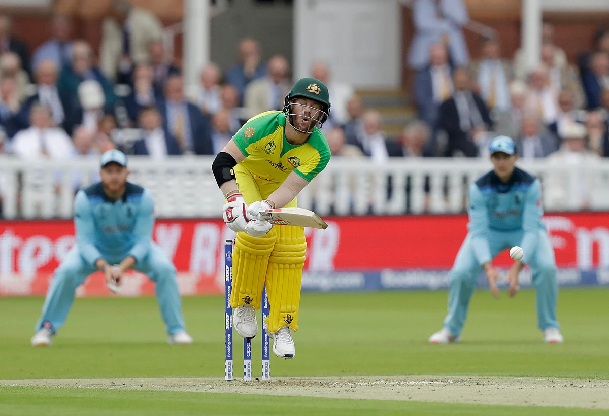 Australia’s David Warner jumps while trying to play a shot in the league game against England, in London, on June 25, 2019. (Photograph: AP/PTI)
