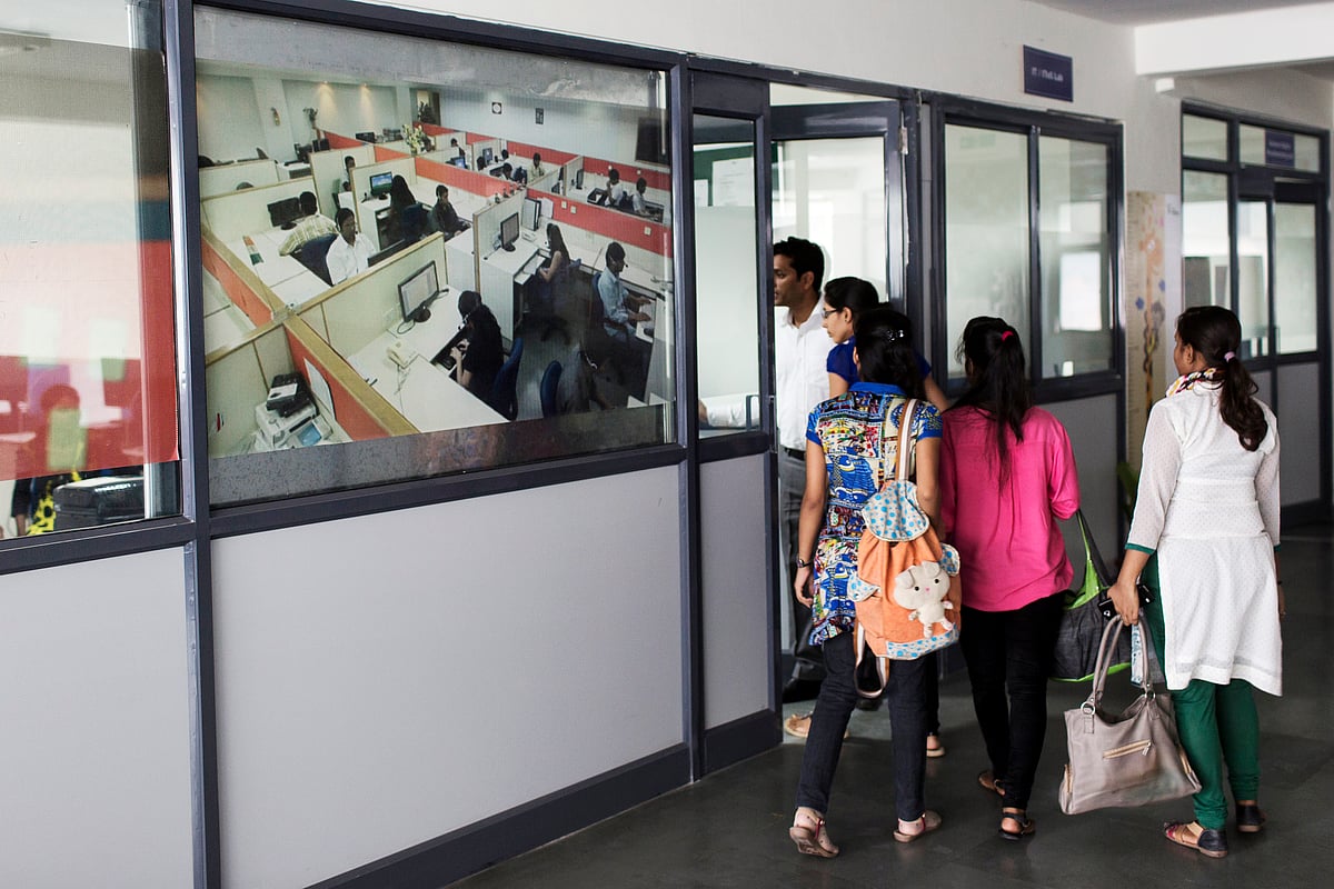 Young women enter a skilling institute in New Delhi. (Photograph: Udit Kulshrestha/Bloomberg)