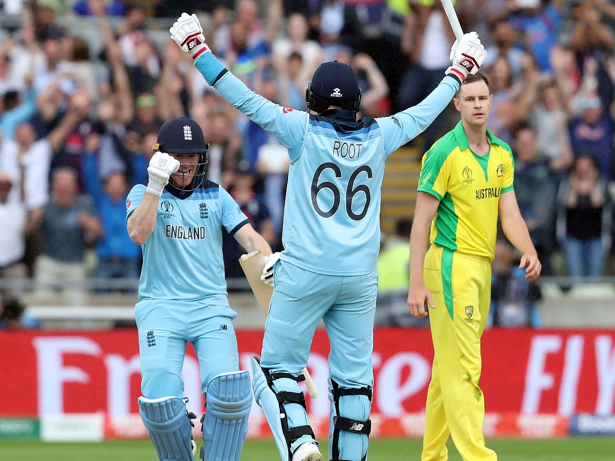 England’s Eoin Morgan and Joe Root celebrate after beating Australia, in the Cricket World Cup semi-final, in Birmingham, on July 11, 2019. (Photograph: AP/PTI)