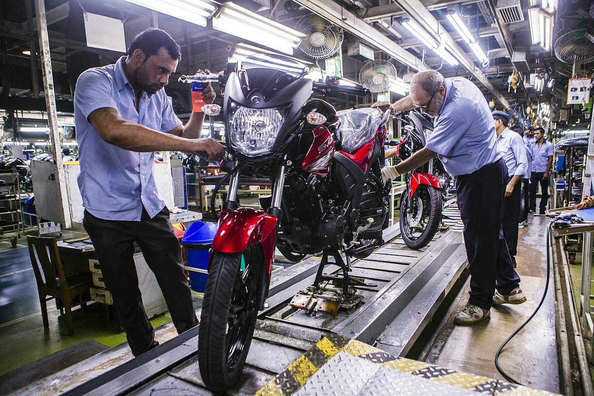 <div class="paragraphs"><p>Workers assemble motorcycles at the Yamaha Motor Co. plant  (Photographer: Prashanth Vishwanathan/Bloomberg)</p></div>