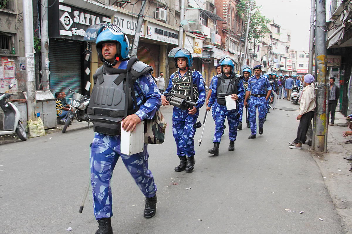  Rapid Action Force (RAF) personnel patrol a street during restrictions in Jammu. (PTI)&nbsp;