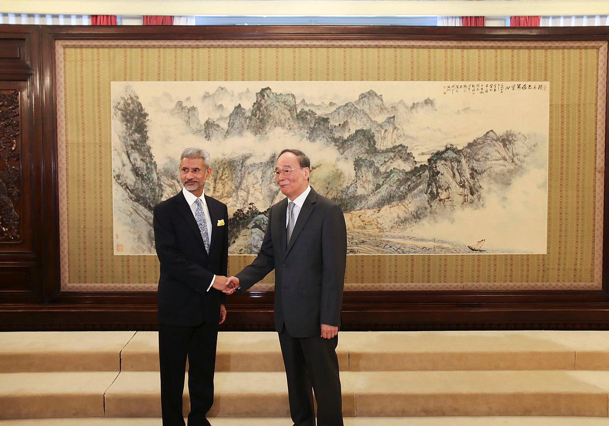 External Affairs Minister Subrahmanyam Jaishankar shakes hands with Chinas Vice President Wang Qishan during a meeting at Diaoyutai State Guesthouse, in Beijing. (Source: PTI)