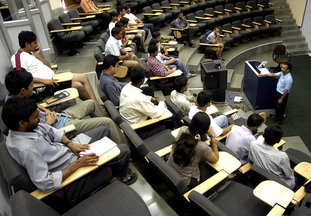 Students attend a lecture in the Seminar Hall at the Indian Institute of Technology, Bombay in Mumbai (Photographer: Santosh Verma/ Bloomberg News) &nbsp;