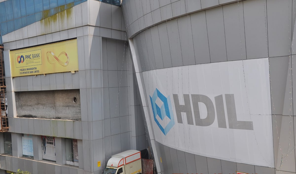 Logos of PMC Bank and HDIL seen at Dreams Mall in Bhandup, Mumbai. (Photographer: Benny Antony/BloombergQuint)