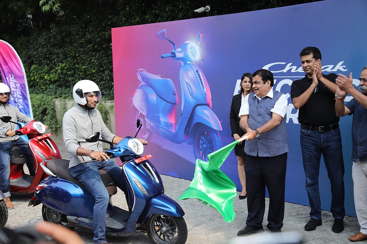 Nitin Gadkari, Minister of Road Transport and Highways, and Bajaj Auto MD Rajiv Bajaj flagging off the Chetak Electric Yatra in Delhi.