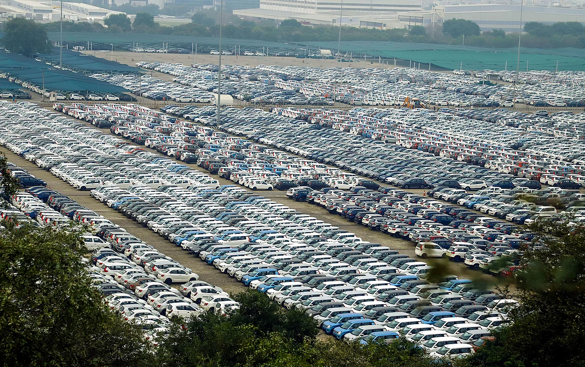 Newly manufactured Maruti Suzuki cars are seen parked inside the company factory in Manesar near Gurugram in September. (Source: PTI)