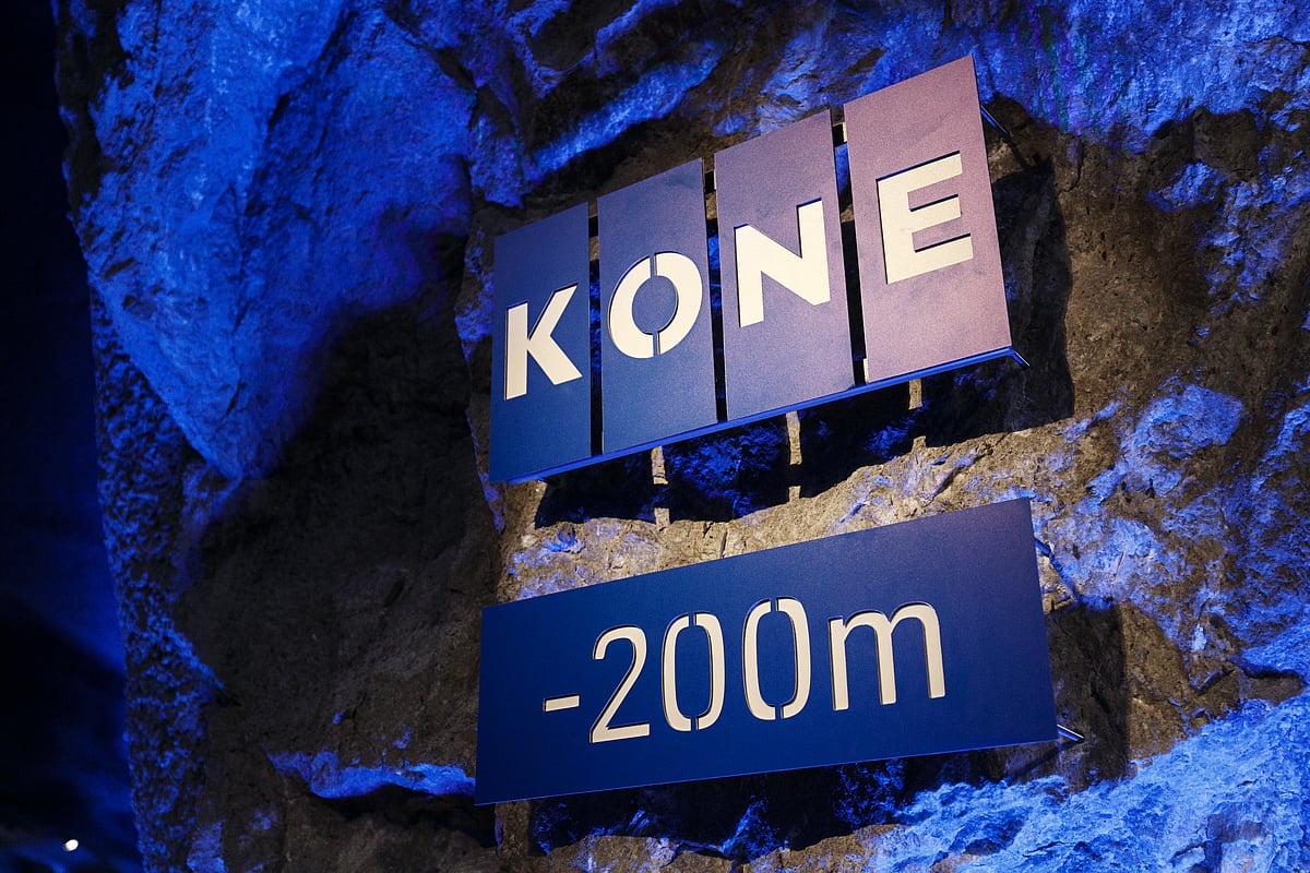 A sign sits in the visitor cave lobby at the Kone Oyj High Rise Laboratory in Tytyri, Finland. (Photographer: Roni Rekomaa/Bloomberg) &nbsp;