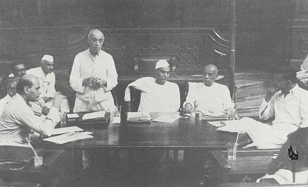 Jawaharlal Nehru addressing a meeting of a committee of the Constituent Assembly New Delhi, 1949. Rajendra Prasad and Vallabhbhai Patel are seated next to Nehru. (Photograph: NMML/Government of India)