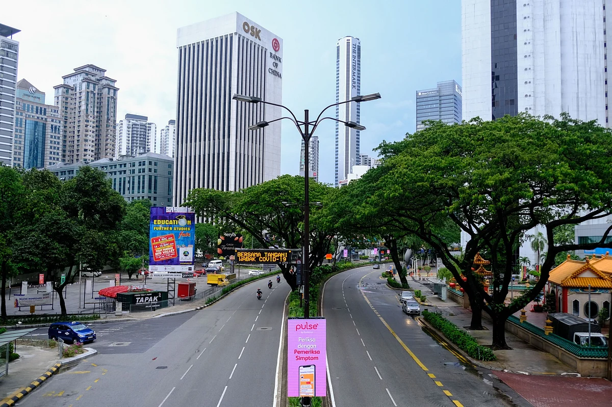 An empty highway in Kuala Lumpur, on Malaysia’s first day in lock-down, March 18, 2020. (Photographer: Samsul Said/Bloomberg)