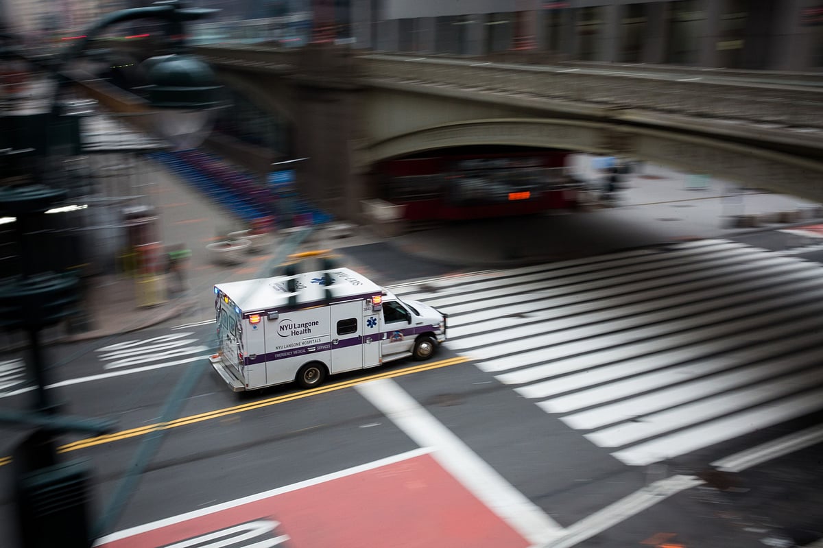 An NYU Langone Health ambulance drives past Grand Central Station in New York, U.S. (Photographer: Michael Nagle/Bloomberg)