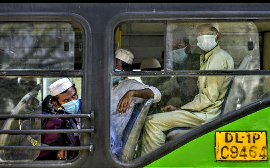 Tablighi Jamaat members after testing negative for Covid-19 twice, being taken to a quarantine centre. (Photograph: PTI)