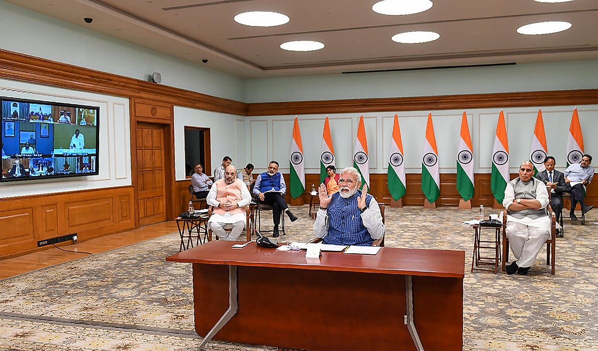 Prime Minister Narendra Modi interacts with all chief ministers to discuss ways to check the spread of coronavirus through a video conference, in New Delhi. (Source: BJP4India/Twitter)