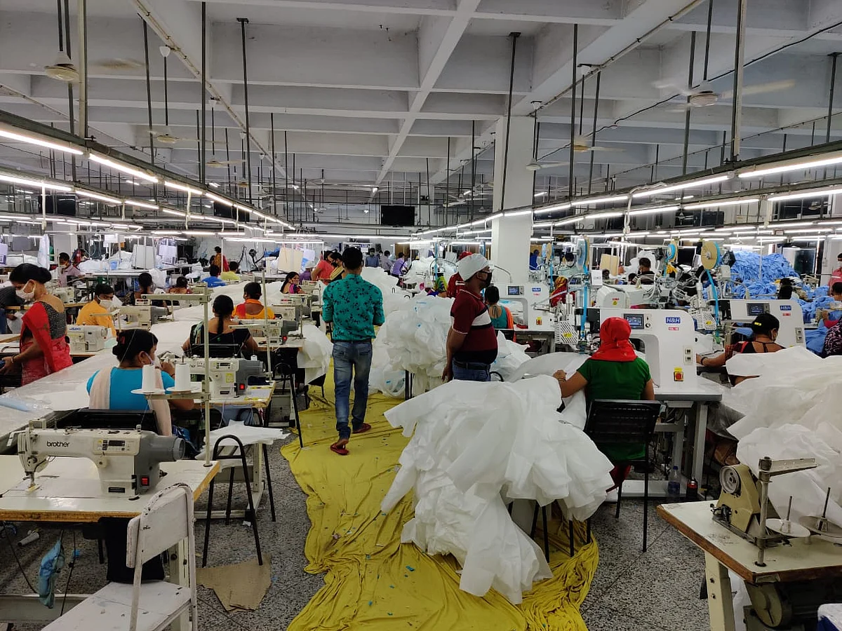 Workers making coveralls at a Matrix Clothing unit in Gurugram, Haryana. (Source: Matrix Clothing Pvt.)