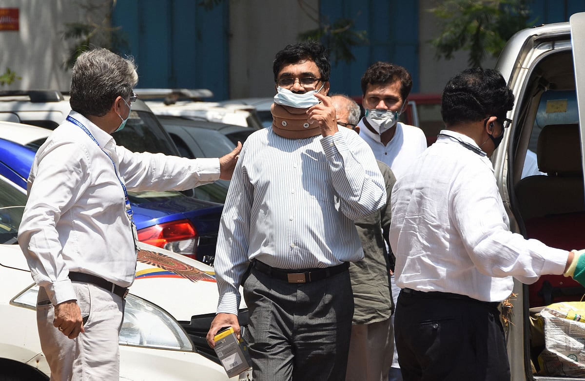 Activist and scholar Anand Teltumbde arrives to surrender before the National Investigation Agency,  in Mumbai, on April 14, 2020. (Photograph: PTI)
