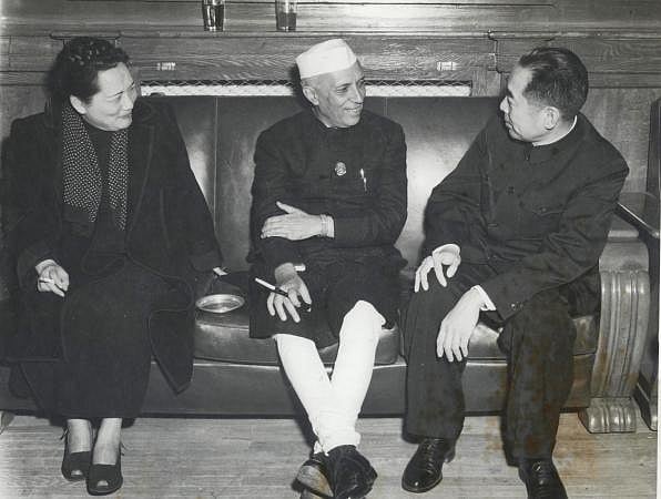 Jawaharlal Nehru with Chou En-Lai and Madam Sun Yat-sen, in Peking, 1954. (Photograph: NMML/Government of India)