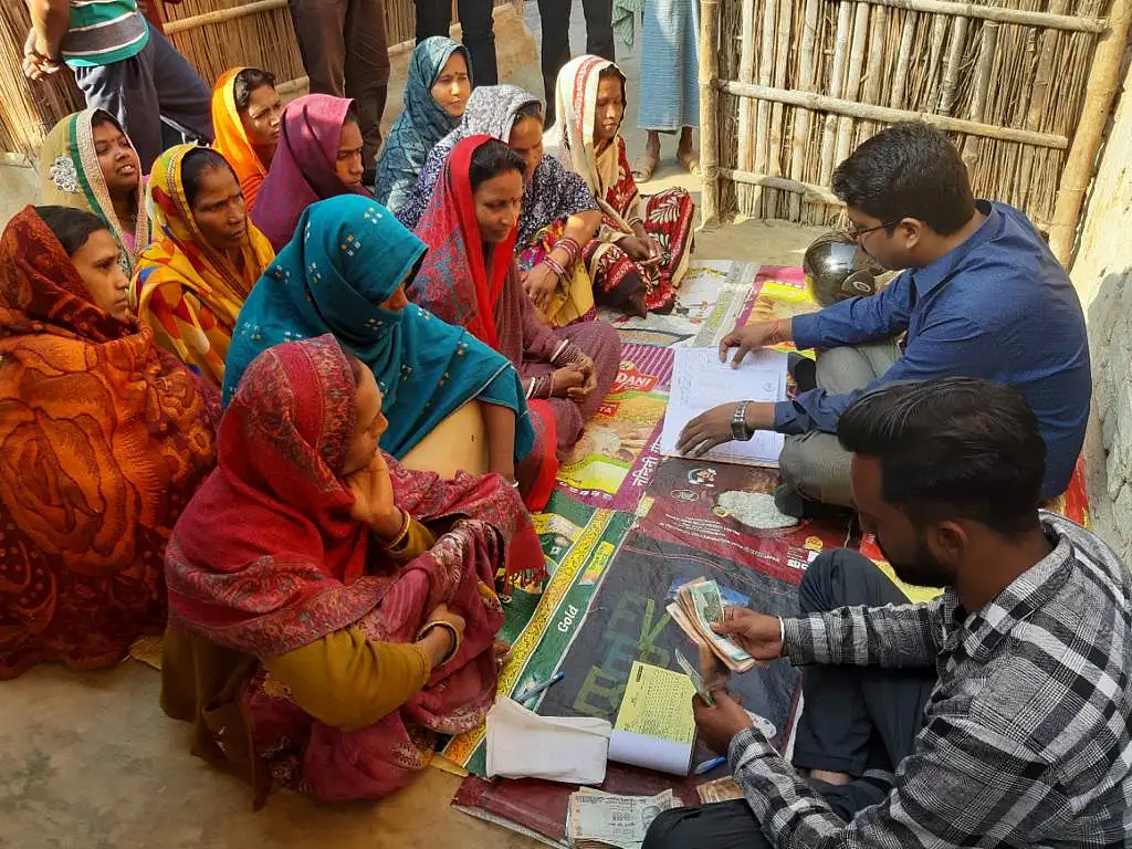 <div class="paragraphs"><p>Micro loan borrowers attending a joint lending group session.</p></div>