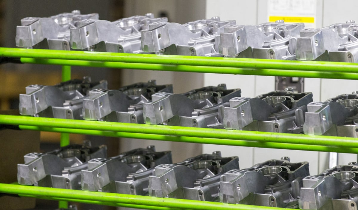 <div class="paragraphs"><p>Finished die casted auto parts wait to be inspected at a factory. (Photographer: Chris Keane/Bloomberg)</p></div>