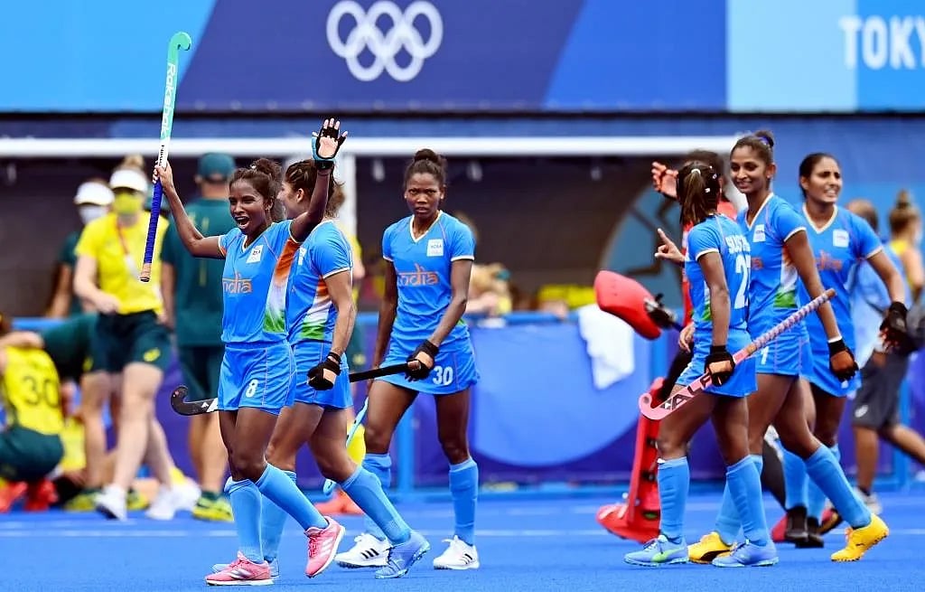 <div class="paragraphs"><p>India  defender Nikki Pradhan lifts her hockey stick to celebrate the quarterfinal win over Australia, at the Olympic Games, in Tokyo, on Aug. 2, 2021. (Photograph: Hockey India)</p></div>
