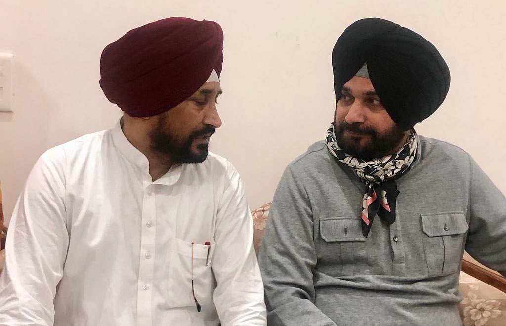 <div class="paragraphs"><p>Charanjit Singh Channi with Navjot Singh Sidhu. (Photograph: Charanjit S Channi/Twitter)</p></div>