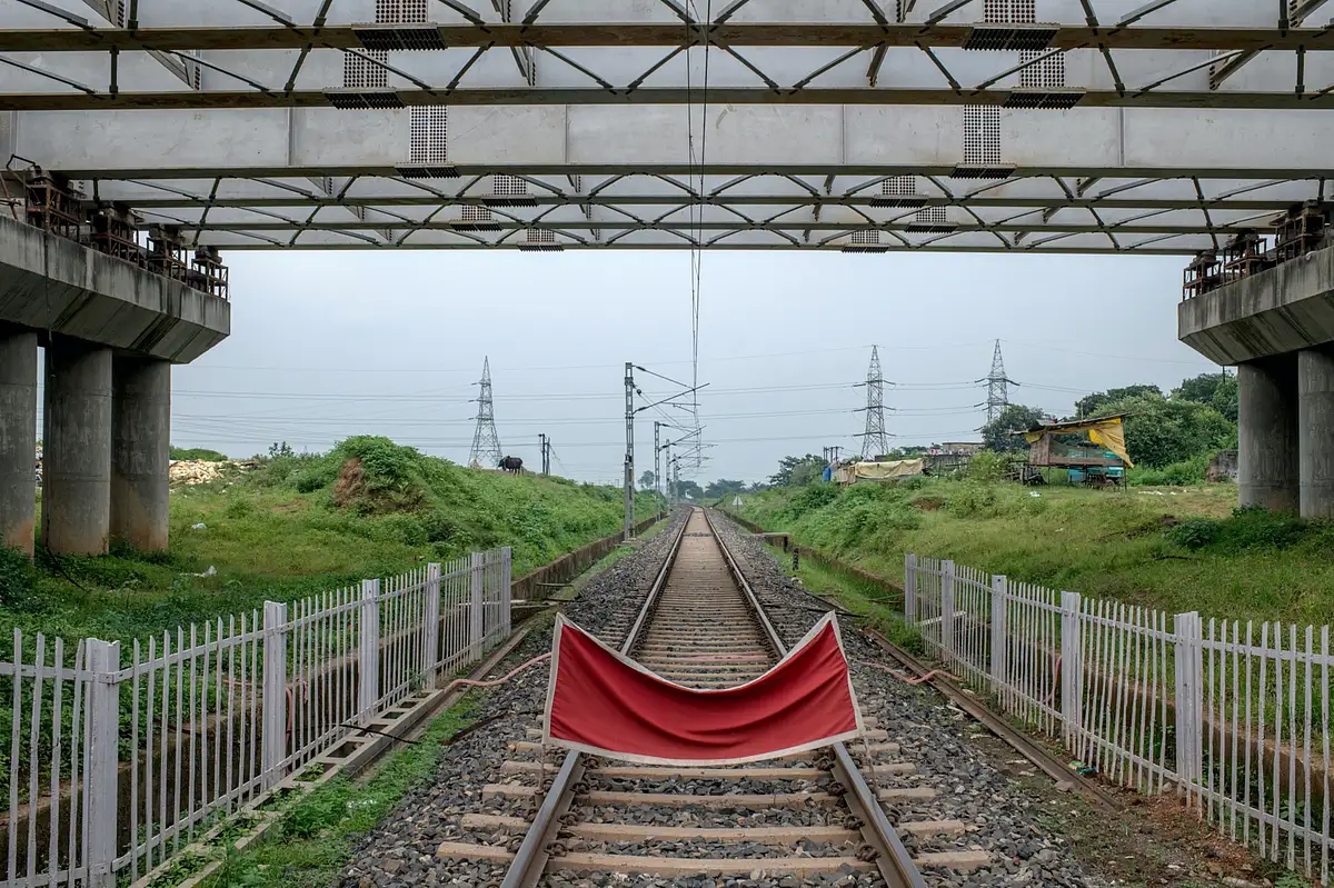 <div class="paragraphs"><p>A red flag is placed across rail tracks to inform approaching trains of work ahead in Ranchi, Jharkand, India, on Thursday, Aug. 26, 2021. Photographer: Arko Datto/Bloomberg</p></div>