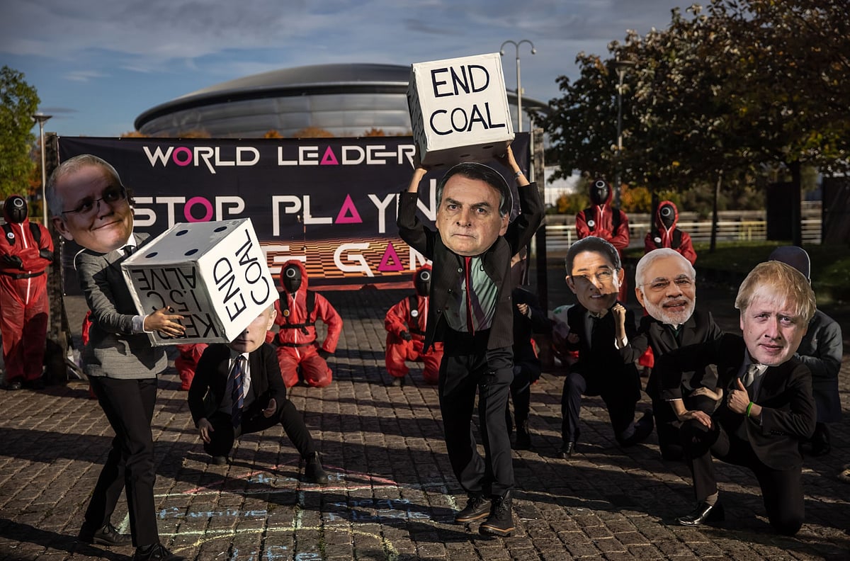 <div class="paragraphs"><p>Climate-change activists hold a demonstration during the COP26 climate talks in Glasgow, U.K., on Nov. 2, 2021. (Photographer: Jonne Roriz/Bloomberg)</p></div>