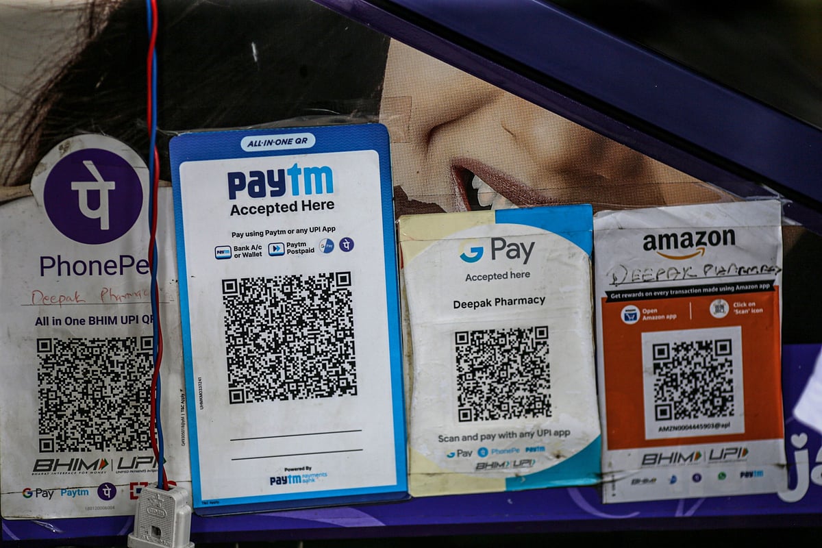 <div class="paragraphs"><p>A store advertises the use of PhonePe, Paytm, Google Pay and Amazon Pay digital payment systems in Mumbai. (Photographer: Dhiraj Singh/Bloomberg)</p></div>