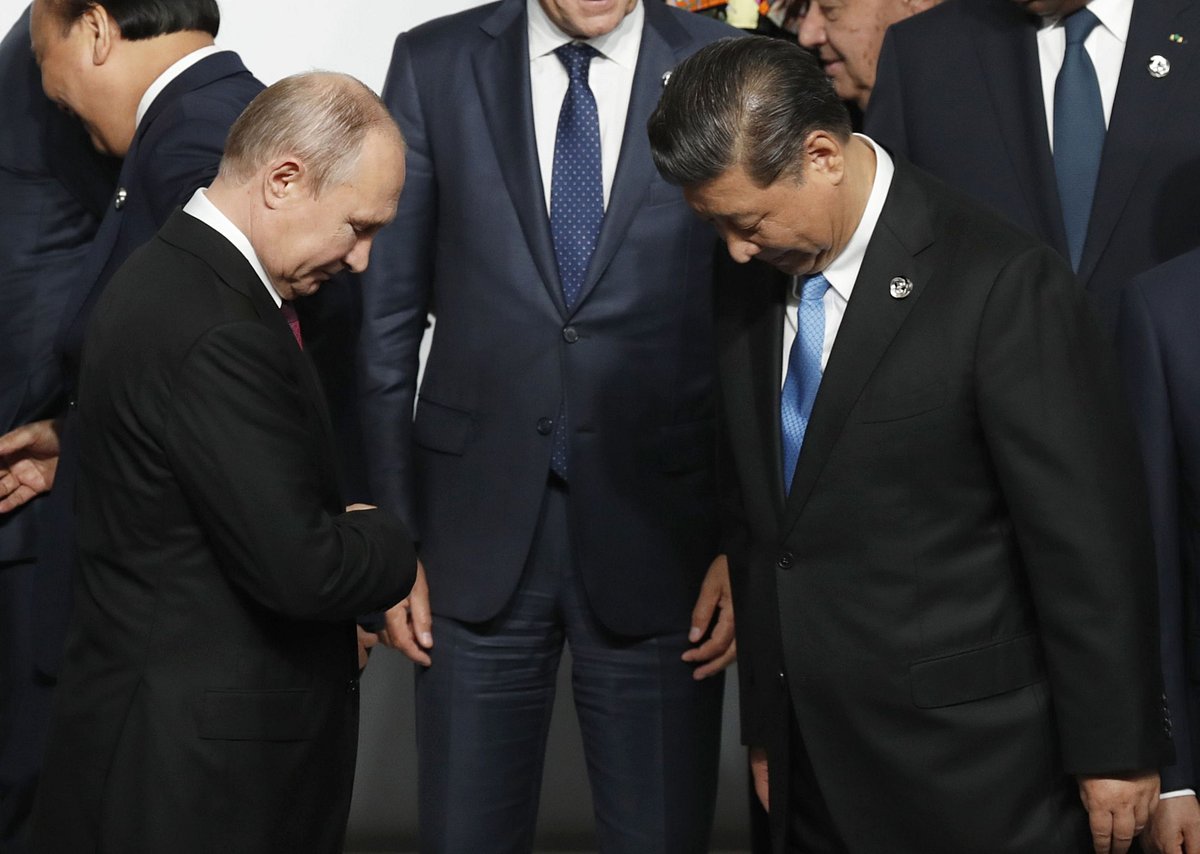 <div class="paragraphs"><p>Vladimir Putin  and Xi Jinping, before a photo session at the G-20 summit in Osaka, Japan, on June 28, 2019. (Photographer: Kim Kyung-Hoon/Pool via Bloomberg)</p></div>