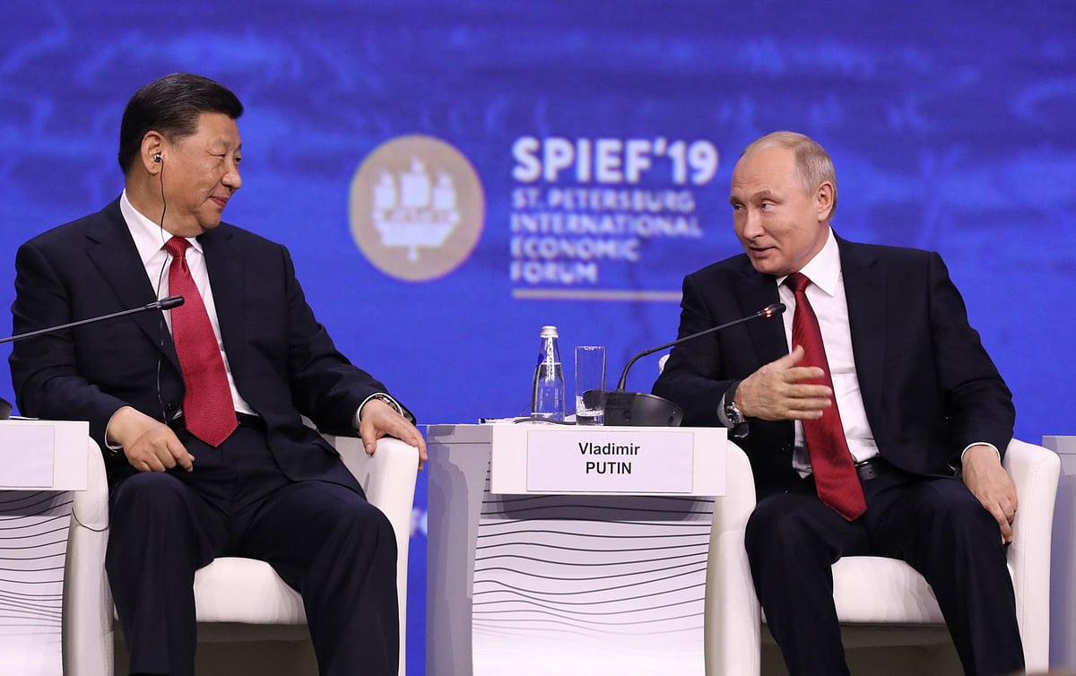 <div class="paragraphs"><p>Vladimir Putin sits beside Xi Jinping, at the St. Petersburg International Economic Forum, on June 7, 2019. (Photographer: Andrey Rudakov/Bloomberg)</p></div><div class="paragraphs"><p><br></p></div>