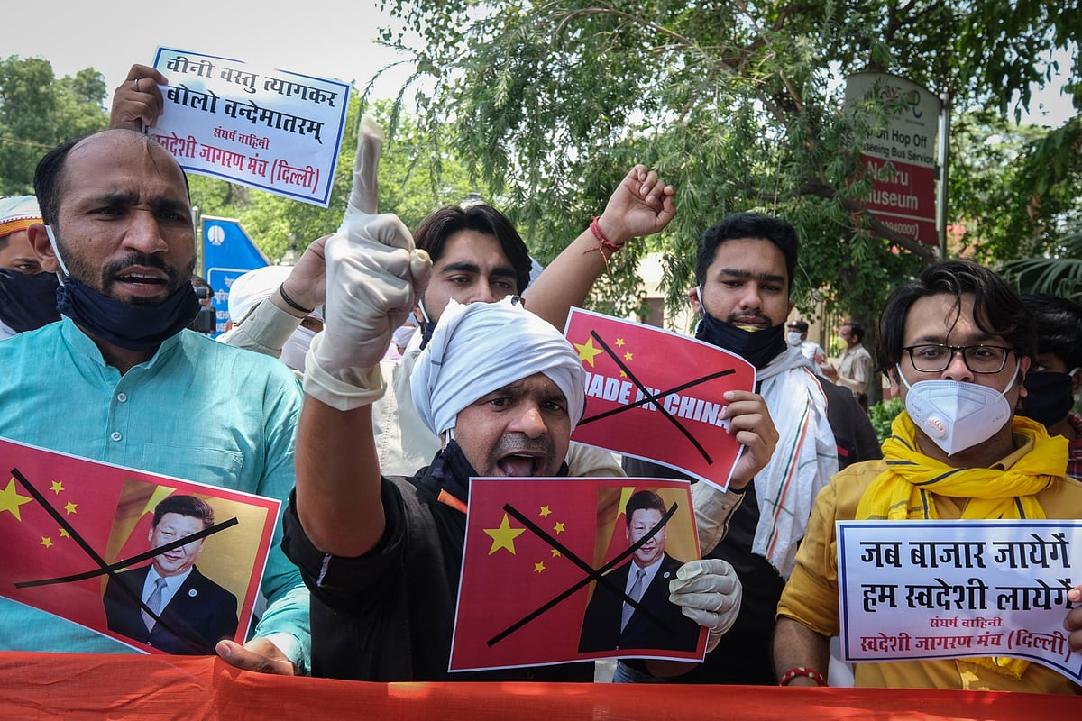 <div class="paragraphs"><p> Swadeshi Jagran Manch activists protesting  outside the Chinese Embassy in New Delhi, on June 17, 2020. (Photographer: T. Narayan/Bloomberg)</p></div>