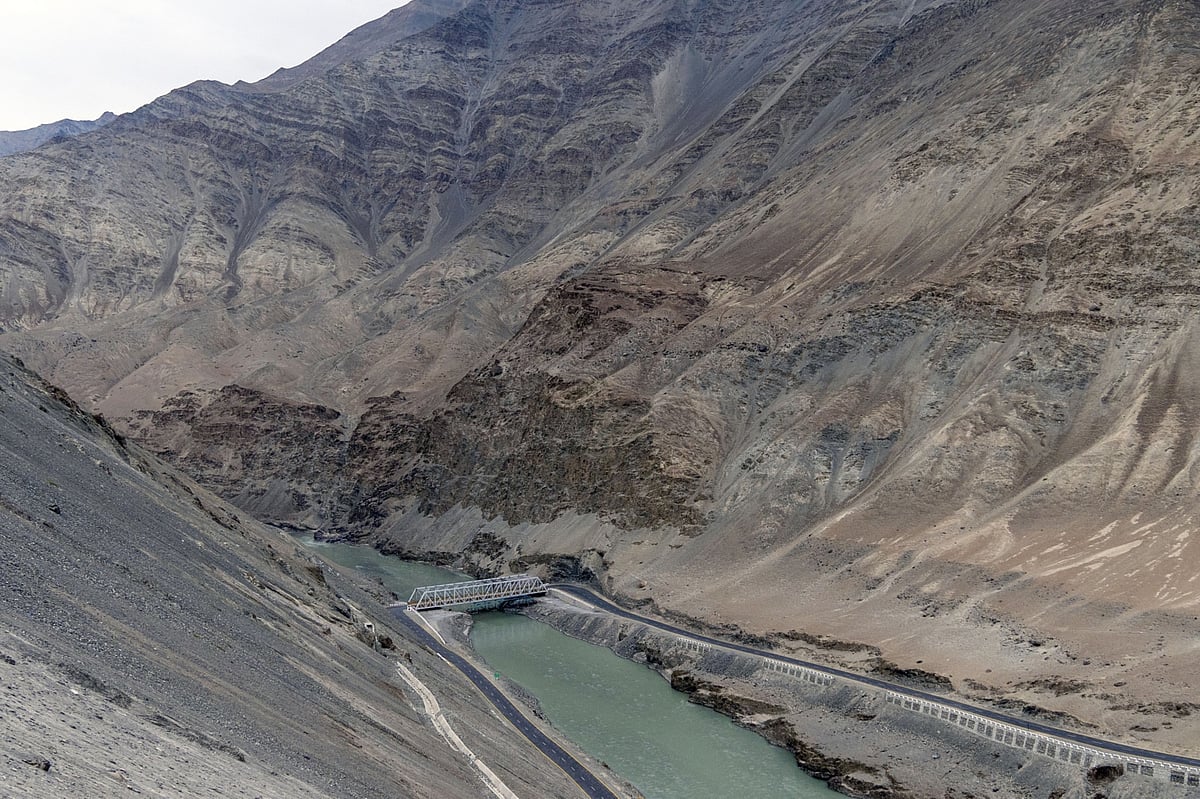 <div class="paragraphs"><p>A bridge over the Indus river connects with the Zanskar Highway, an under construction road, in Leh on Sept. 23, 2021. (Photographer: Sumit Dayal/Bloomberg)</p></div>