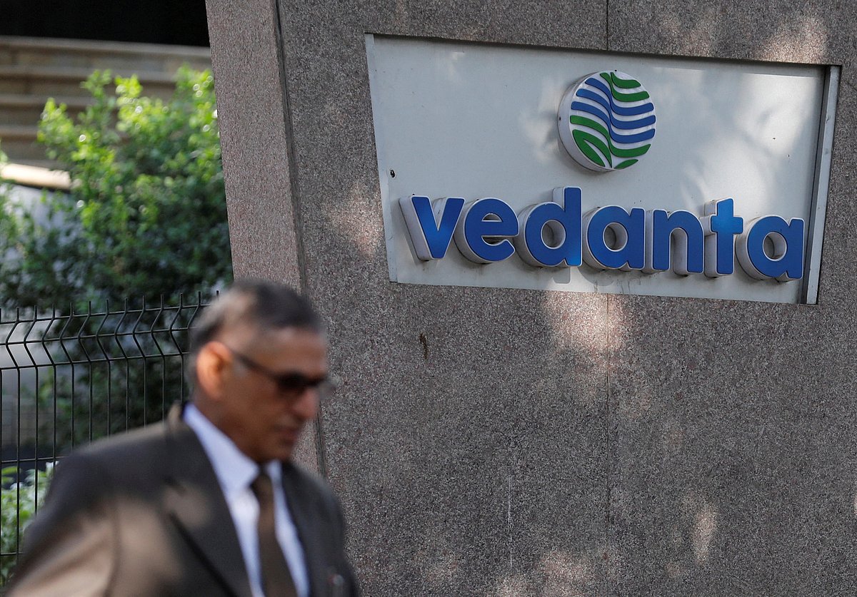 <div class="paragraphs"><p>A man walks past the logo of Vedanta outside its headquarters in Mumbai. (Photo: Danish Siddiqui/Reuters)</p></div>