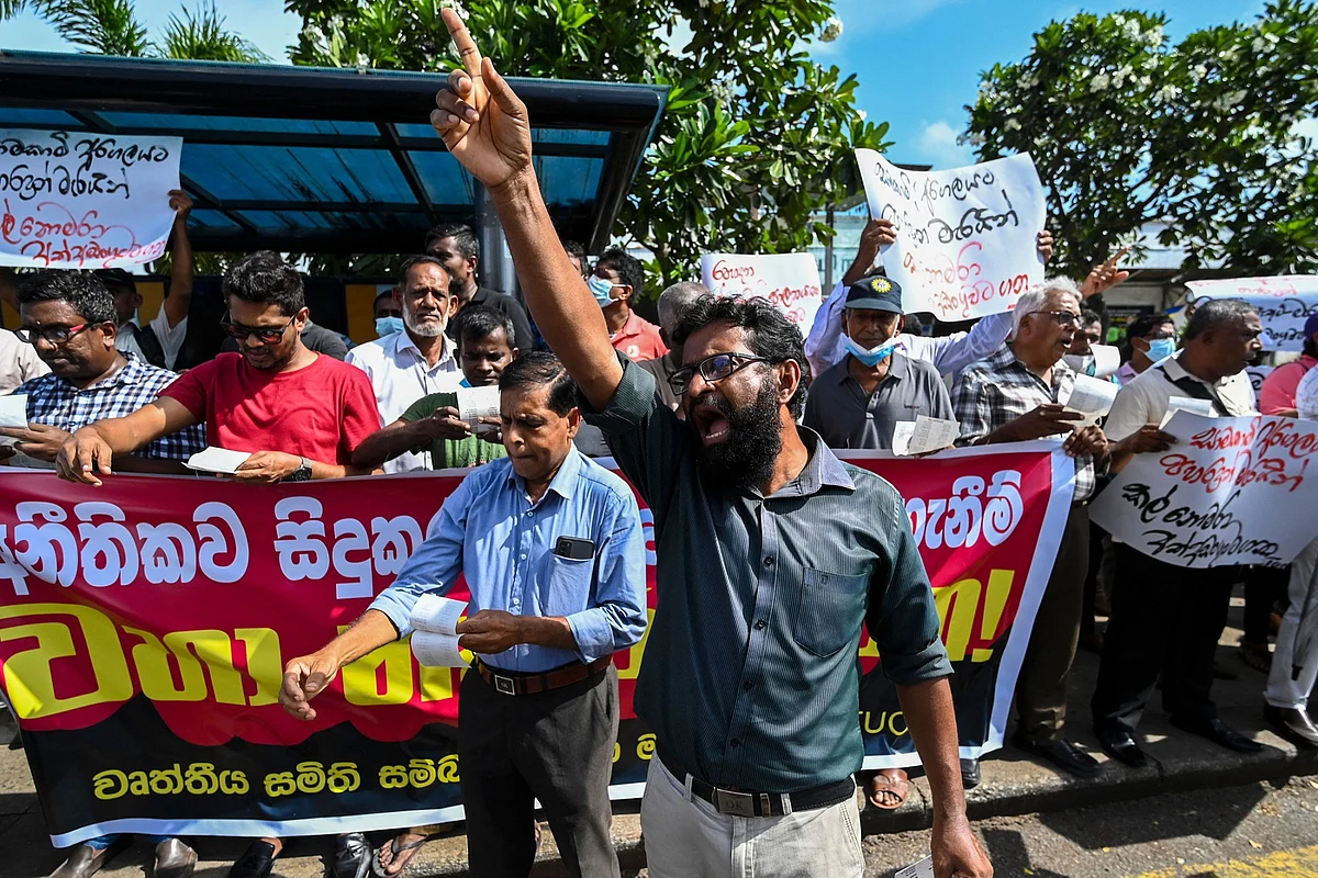 Protestors at an ongoing anti-government demonstration in Colombo on May 18.Photographer: Ishara S. Kodikara/AFP/Getty Images