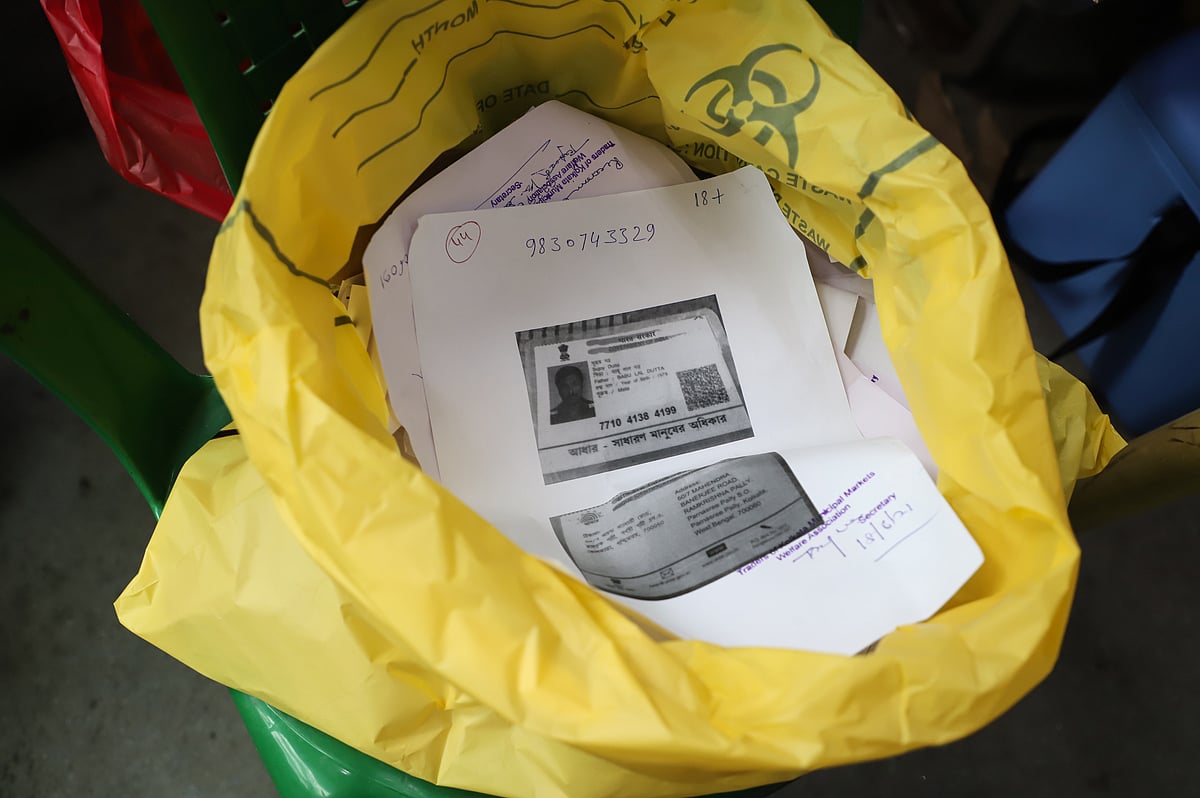 <div class="paragraphs"><p>Photocopy of an aadhar card in a bag. (Photo by Rajpratim Ray/Pacific Press/Sipa USA/Reuters)</p></div>