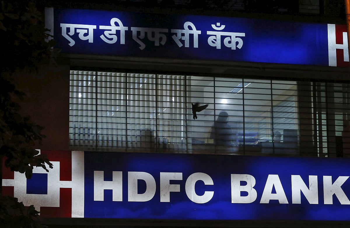 <div class="paragraphs"><p>A bird flies past a window of a HDFC Bank branch. (Photo: Rueters/Shailesh Andrade)</p></div>