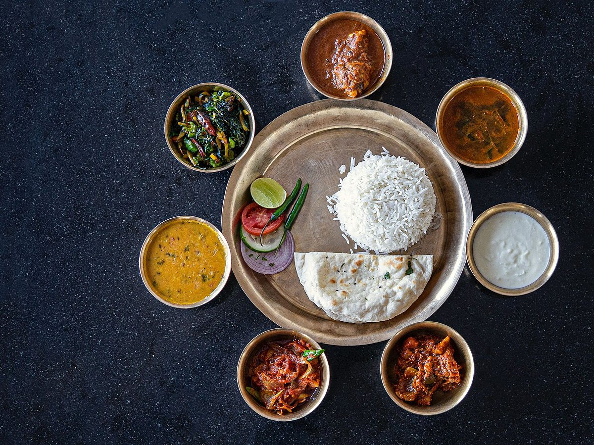 <div class="paragraphs"><p>A thali with servings of Indian food. (Photograph: by <a href="https://unsplash.com/@rajat_sarki?utm_source=unsplash&amp;utm_medium=referral&amp;utm_content=creditCopyText">rajat sarki</a> on <a href="https://unsplash.com/?utm_source=unsplash&amp;utm_medium=referral&amp;utm_content=creditCopyText">Unsplash</a>)</p></div>