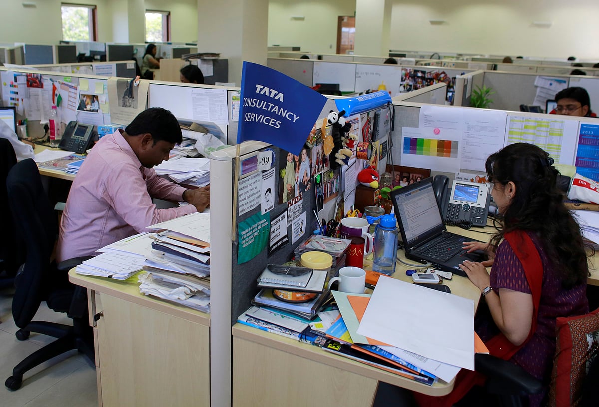<div class="paragraphs"><p>Employees of Tata Consultancy Services work inside the company headquarters in Mumbai.(REUTERS/Danish Siddiqui)</p></div>