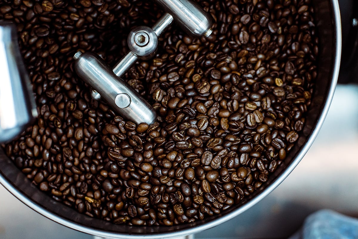 <div class="paragraphs"><p>Coffee beans are roasted inside a  coffee roaster. (Photo: Gregory-Hayes/ Unsplash)</p></div>
