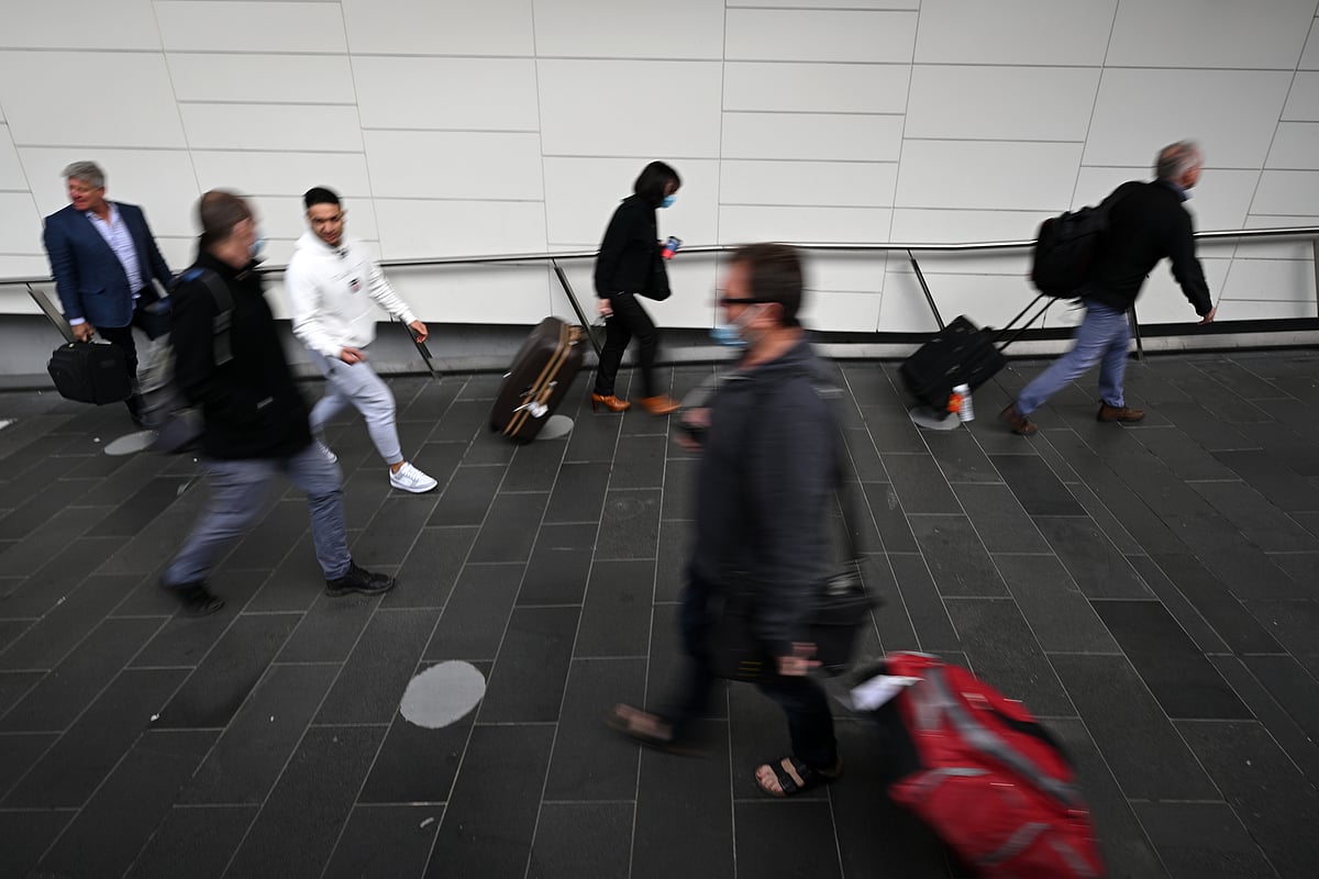 <div class="paragraphs"><p>Travelers at Melbourne Airport in Melbourne. (Source: AAP Image/Joel Carrett/ Reuters)</p></div>